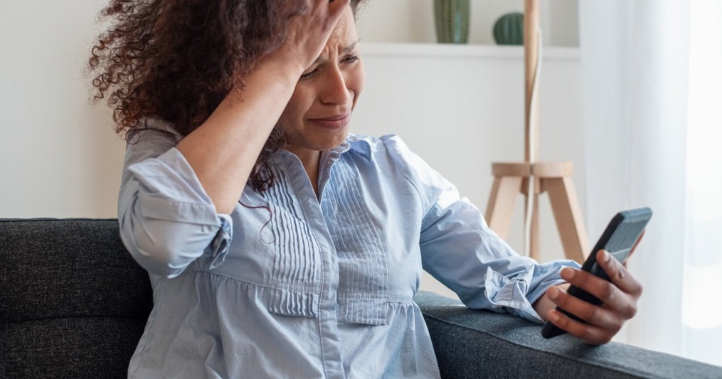 Staring at your phone waiting for a message of reconciliation that never comes? Yeah, you're in the denial stage.
